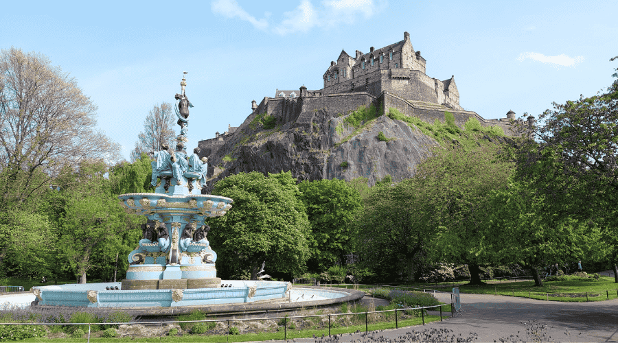 view of edinburgh castle from princes street gardens